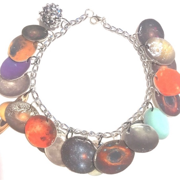 Galaxy Gift Set!
Pink galaxy crossbody purse
Deep space galaxy charm bracelet - Picture 3 of 5